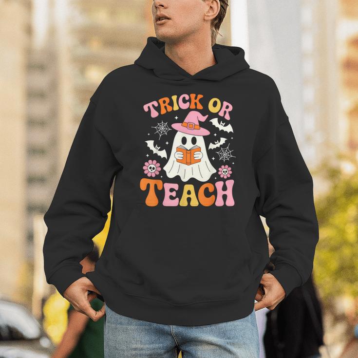 Trick Or Teach Cute Floral Ghost Teacher Halloween Costume Unisex Hoodie, funny gift Trick Or Teach Cute Floral Ghost Teacher Halloween Costume Unisex Hoodie, funny gift