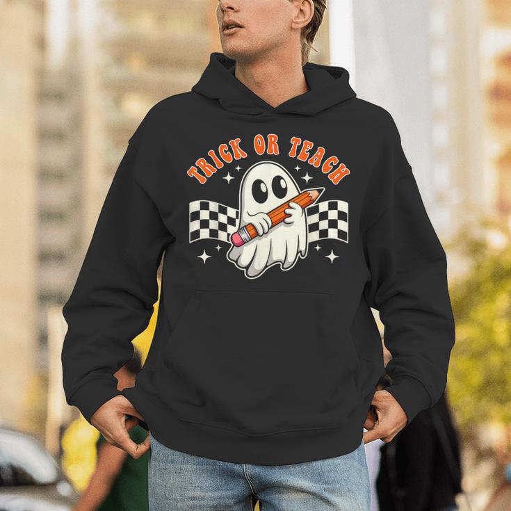 Trick Or Teach Groovy Retro Ghost Halloween Teacher Kids Unisex Hoodie, Groovy Teacher Hoodies, funny gift