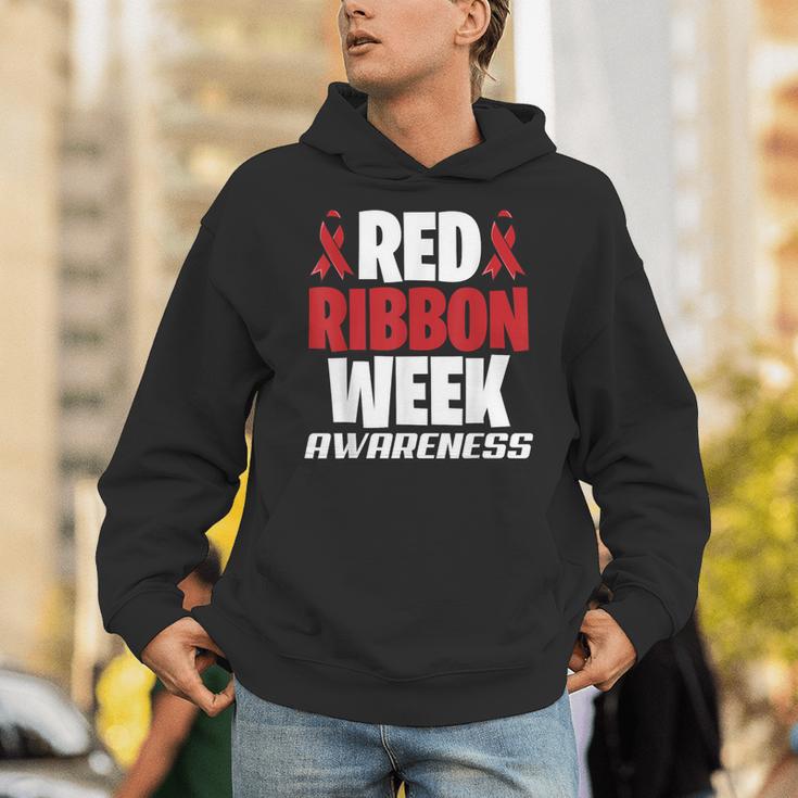 We Wear Red For Red Ribbon Week Awareness Mothers Teachers Unisex Hoodie, funny gift We Wear Red For Red Ribbon Week Awareness Mothers Teachers Unisex Hoodie, funny gift