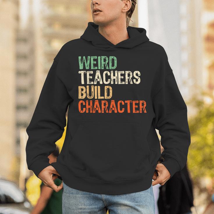 Weird Teachers Build Character Teacher Appreciation Week Day Unisex Hoodie, funny gift