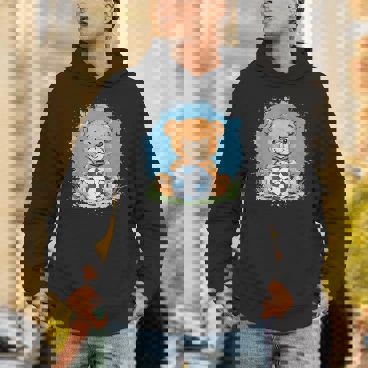 サッカーボール付きのかわいいテディベア パーカー