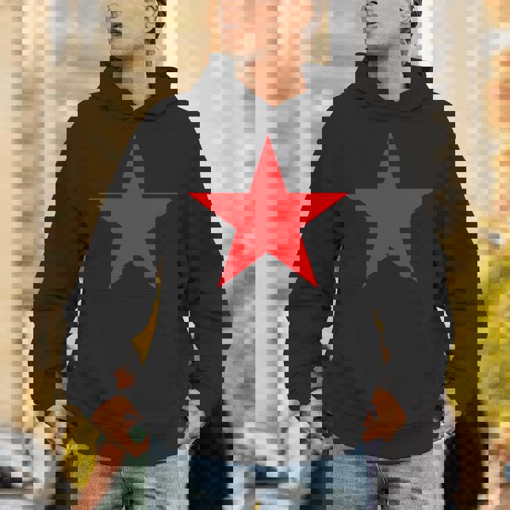 複数の色の赤い星 長袖tシャツ パーカー