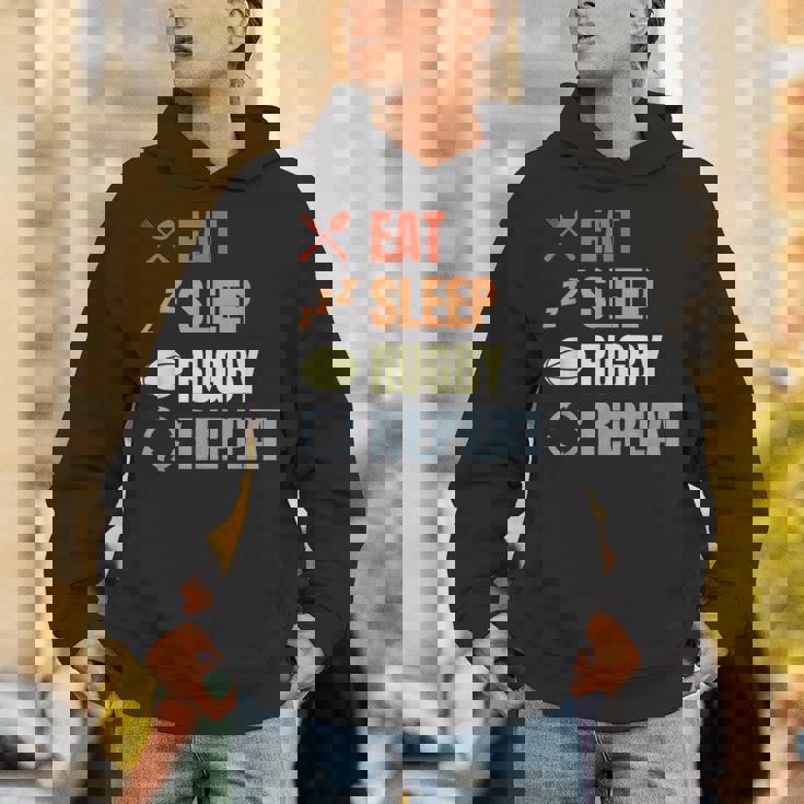 食べる寝るラグビーリピートラグビーコーチチームスポーツ パーカー