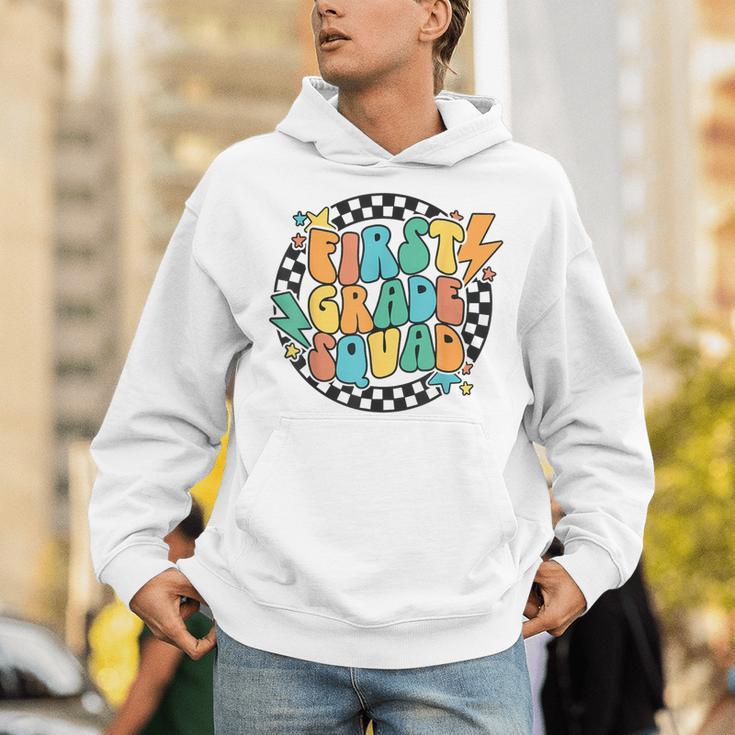 Back To School Groovy Teacher 1st First Grade Crew Squad Unisex Hoodie, Groovy Teacher Hoodies, First Grade Teacher Hoodies, funny gift Back To School Groovy Teacher 1st First Grade Crew Squad Unisex Hoodie, Groovy Teacher Hoodies, First Grade Teacher Hoodies, funny gift