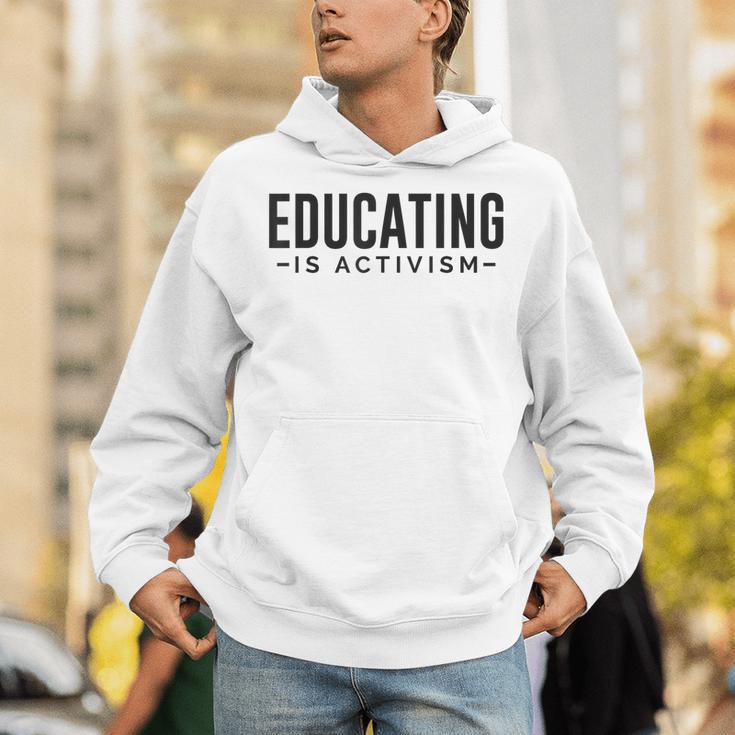 Educating Is Activism Feminist Social Justice Teacher For Men Women Unisex Hoodie, funny gift Educating Is Activism Feminist Social Justice Teacher For Men Women Unisex Hoodie, funny gift