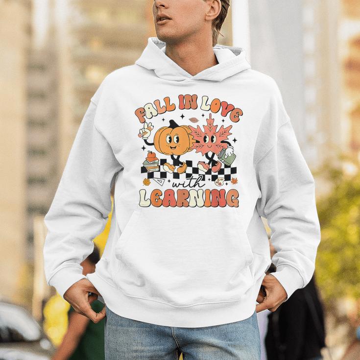 Fall In Love With Learning Teacher Retro Thanksgiving Unisex Hoodie, funny gift Fall In Love With Learning Teacher Retro Thanksgiving Unisex Hoodie, funny gift