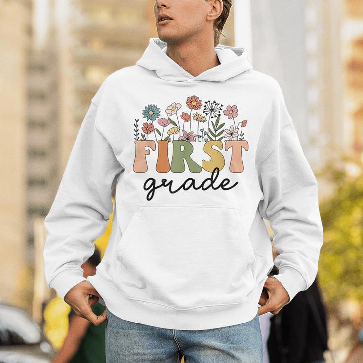 First Grade Teacher Wildflower Back To School Floral Outfits Unisex Hoodie, First Grade Teacher Hoodies, funny gift First Grade Teacher Wildflower Back To School Floral Outfits Unisex Hoodie, First Grade Teacher Hoodies, funny gift
