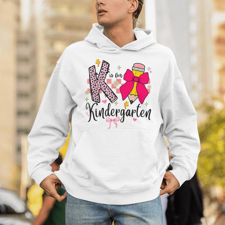 K Is For Kindergarten Teacher Coquette Bow Back To School Unisex Hoodie, funny gift K Is For Kindergarten Teacher Coquette Bow Back To School Unisex Hoodie, funny gift