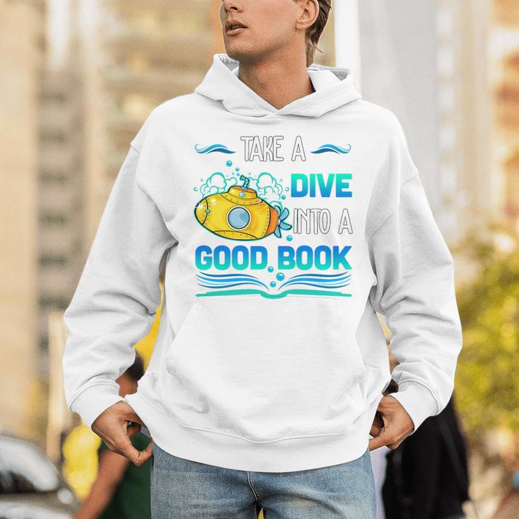Librarian Teacher Dive Into A Good Book Reading Premium Tri-Blend Unisex Hoodie, funny gift