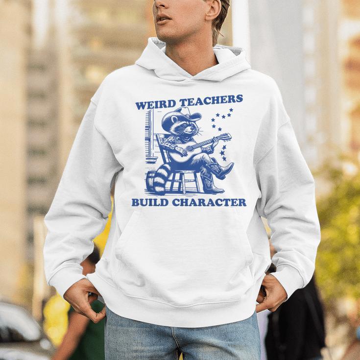 Weird Teachers Build Character Shirt Raccoon Teacher Unisex Hoodie, funny gift