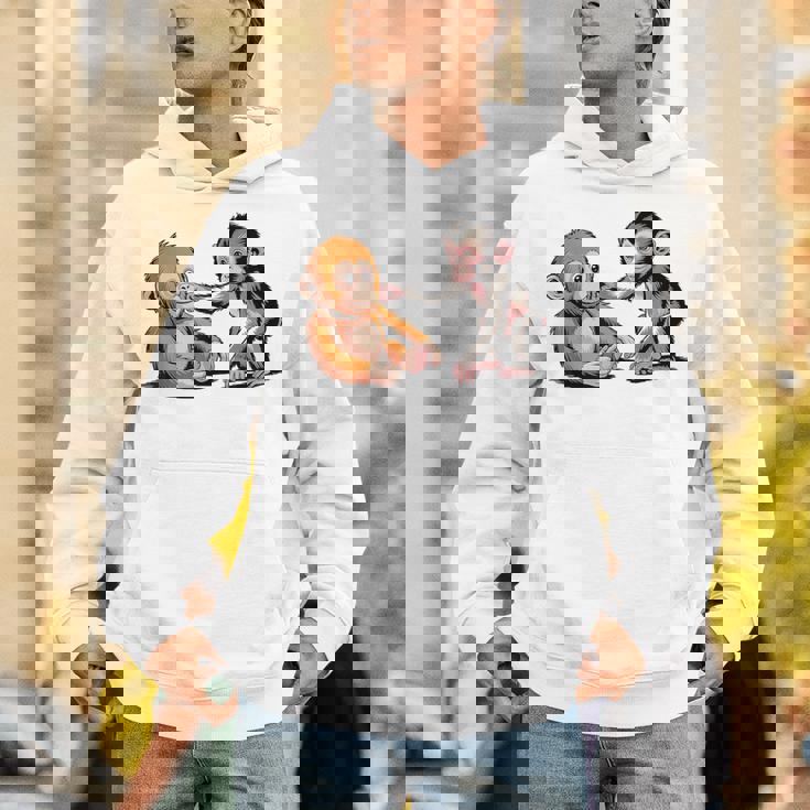 オレンジのおもちゃで悲しい猿のパンチ パーカー