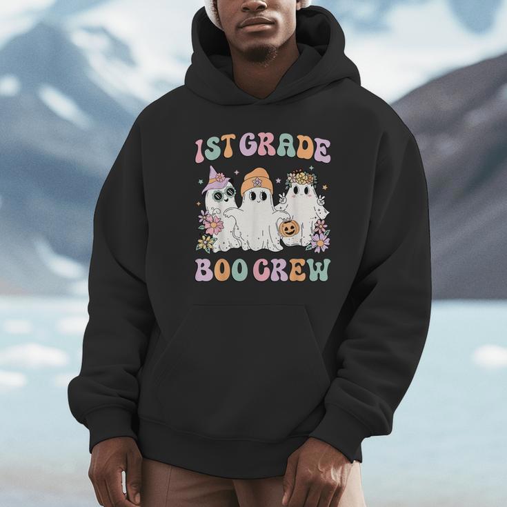 1st Grade Boo Crew Groovy Halloween Floral Ghost Kid Teacher Unisex Hoodie, novelty gifts, funny gifts