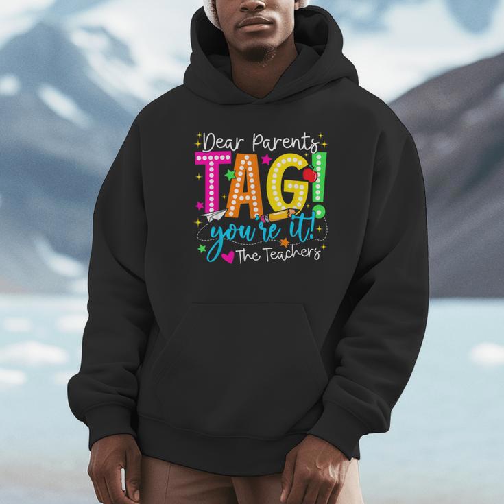 Dear Parents Tag You'Re It Love Teachers Last Day Of School Unisex Hoodie, novelty gifts, funny gifts