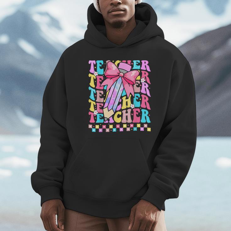 Groovy Teacher Cute Coquette Bow Flower Retro Back To School Unisex Hoodie, novelty gifts, funny gifts Groovy Teacher Cute Coquette Bow Flower Retro Back To School Unisex Hoodie, novelty gifts, funny gifts