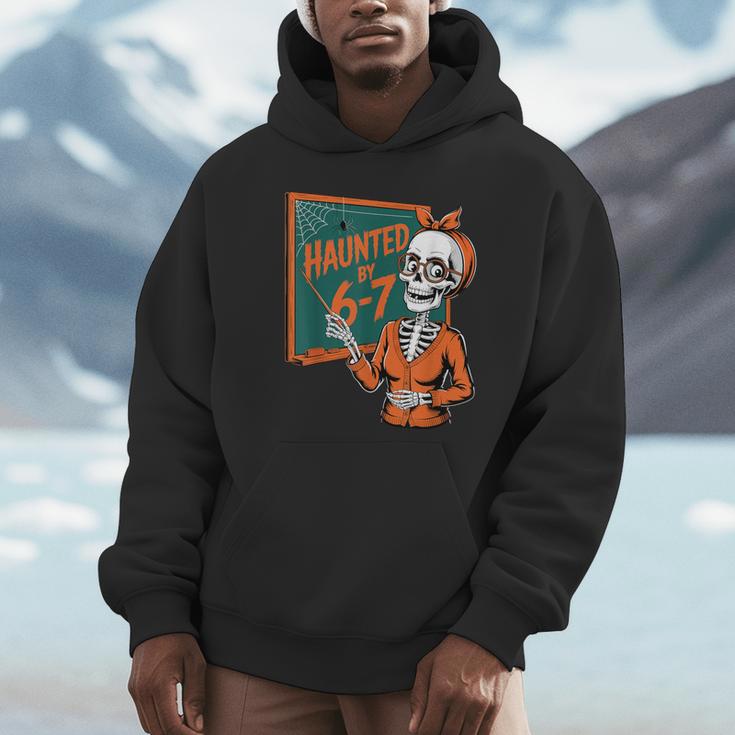 Haunted By 6-7 Six Seven 67 Math Teacher Halloween Skeleton Unisex Hoodie, novelty gifts, funny gifts