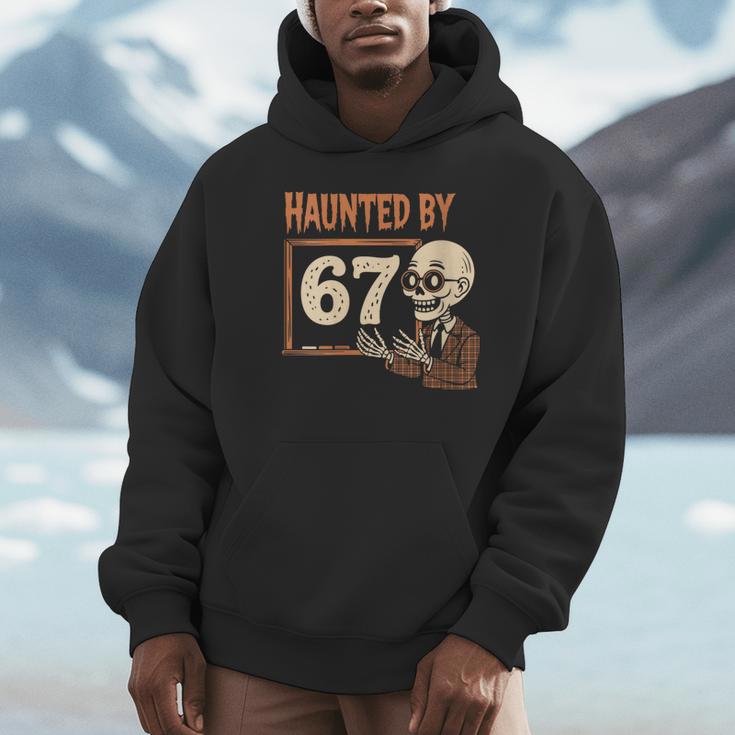 Haunted By 67 Halloween 67 Meme Six Seven Teacher Unisex Hoodie, novelty gifts, funny gifts Haunted By 67 Halloween 67 Meme Six Seven Teacher Unisex Hoodie, novelty gifts, funny gifts
