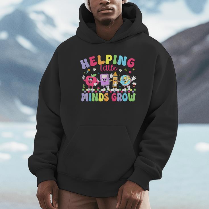 Helping Little Minds Grow Teacher Life Back To School Unisex Hoodie, novelty gifts, funny gifts Helping Little Minds Grow Teacher Life Back To School Unisex Hoodie, novelty gifts, funny gifts