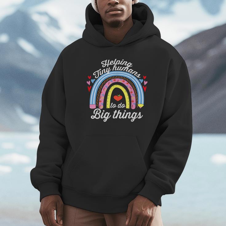 Helping Tiny Humans To Do Big Things Teacher Women Unisex Hoodie, novelty gifts, funny gifts Helping Tiny Humans To Do Big Things Teacher Women Unisex Hoodie, novelty gifts, funny gifts