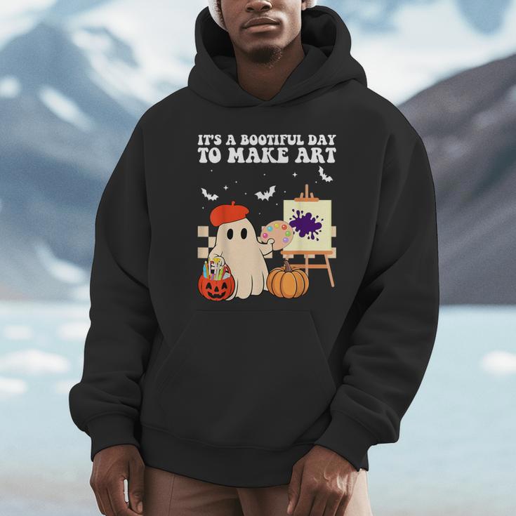 It's A Bootiful Day To Make Art Groovy Art Teacher Halloween Unisex Hoodie, novelty gifts, funny gifts