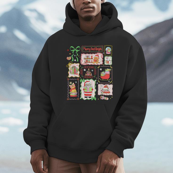 Merry And Bright Christmas Gingerbread Santa Book Teacher Unisex Hoodie, novelty gifts, funny gifts Merry And Bright Christmas Gingerbread Santa Book Teacher Unisex Hoodie, novelty gifts, funny gifts