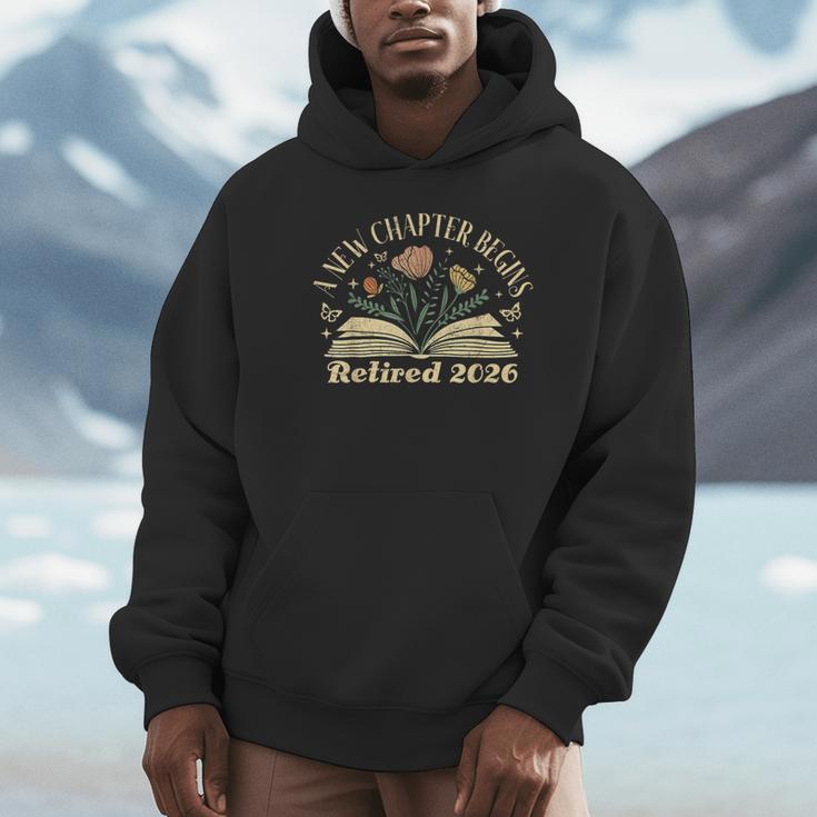 A New Chapter Begins Retired 2026 Teacher Retirement Unisex Hoodie, novelty gifts, funny gifts A New Chapter Begins Retired 2026 Teacher Retirement Unisex Hoodie, novelty gifts, funny gifts