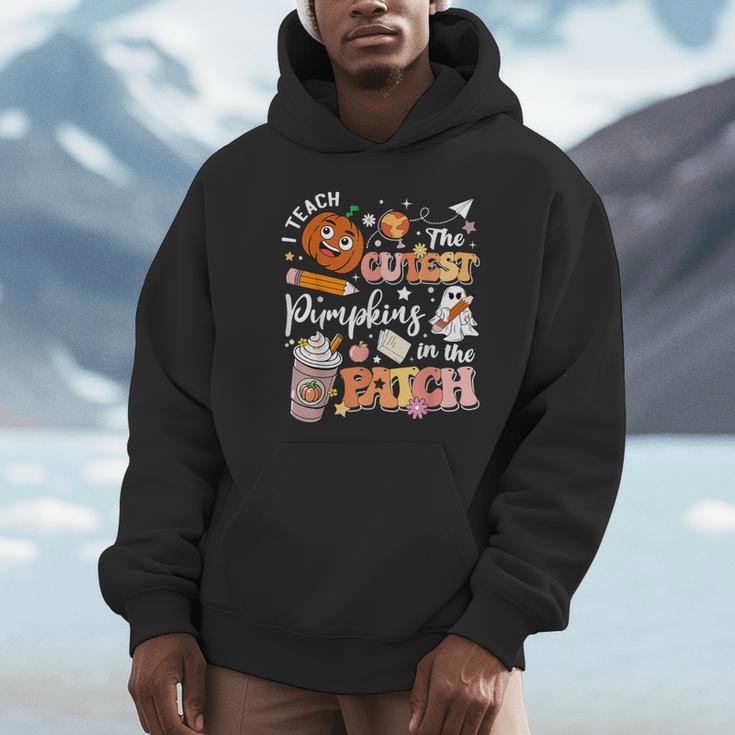 I Teach The Cutest Pumpkins In The Patch Halloween Teacher Unisex Hoodie, novelty gifts, funny gifts