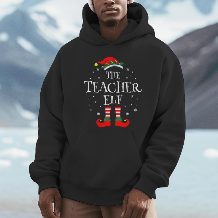 The Teacher Elf Christmas Family Matching Group Xmas Unisex Hoodie, novelty gifts, funny gifts The Teacher Elf Christmas Family Matching Group Xmas Unisex Hoodie, novelty gifts, funny gifts