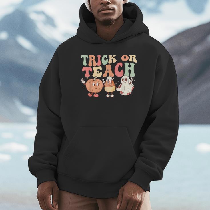 Trick Or Teach Pumpkin Candy Corn Ghost Halloween Teacher Unisex Hoodie, novelty gifts, funny gifts Trick Or Teach Pumpkin Candy Corn Ghost Halloween Teacher Unisex Hoodie, novelty gifts, funny gifts