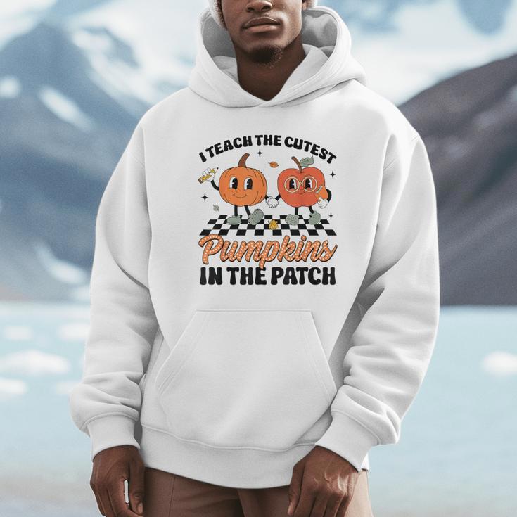 Groovy I Teach The Cutest Pumpkins In The Patch For Teacher Unisex Hoodie, novelty gifts, funny gifts Groovy I Teach The Cutest Pumpkins In The Patch For Teacher Unisex Hoodie, novelty gifts, funny gifts