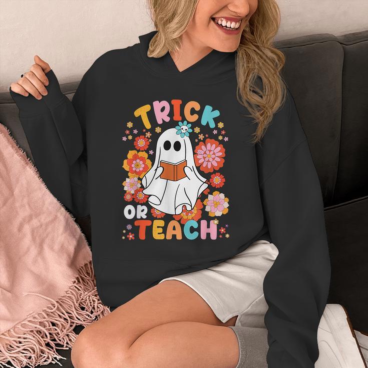 Groovy Halloween Trick Or Teach Retro Floral Ghost Teacher For Men Women Kids Unisex Hoodie, Groovy Teacher Gifts, funny design Groovy Halloween Trick Or Teach Retro Floral Ghost Teacher For Men Women Kids Unisex Hoodie, Groovy Teacher Gifts, funny design