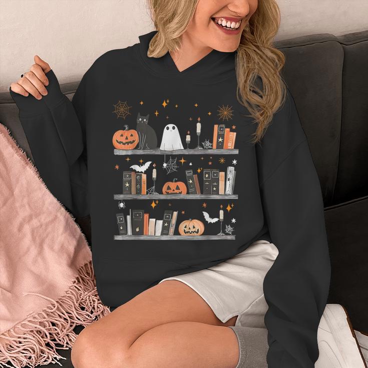 Halloween Library Ghost Books Teacher Spooky Trick Or Teach Unisex Hoodie, funny design