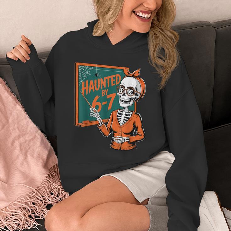 Haunted By 6-7 Six Seven 67 Math Teacher Halloween Skeleton Unisex Hoodie, funny design