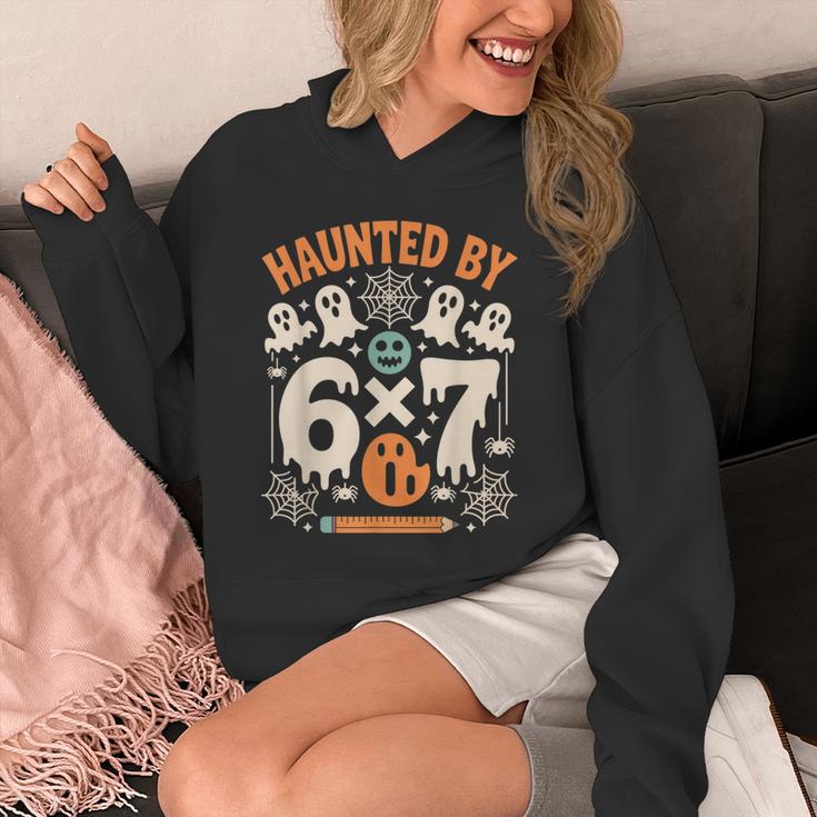 Haunted By 6x7 Math Teacher Halloween Pun Unisex Hoodie, funny design