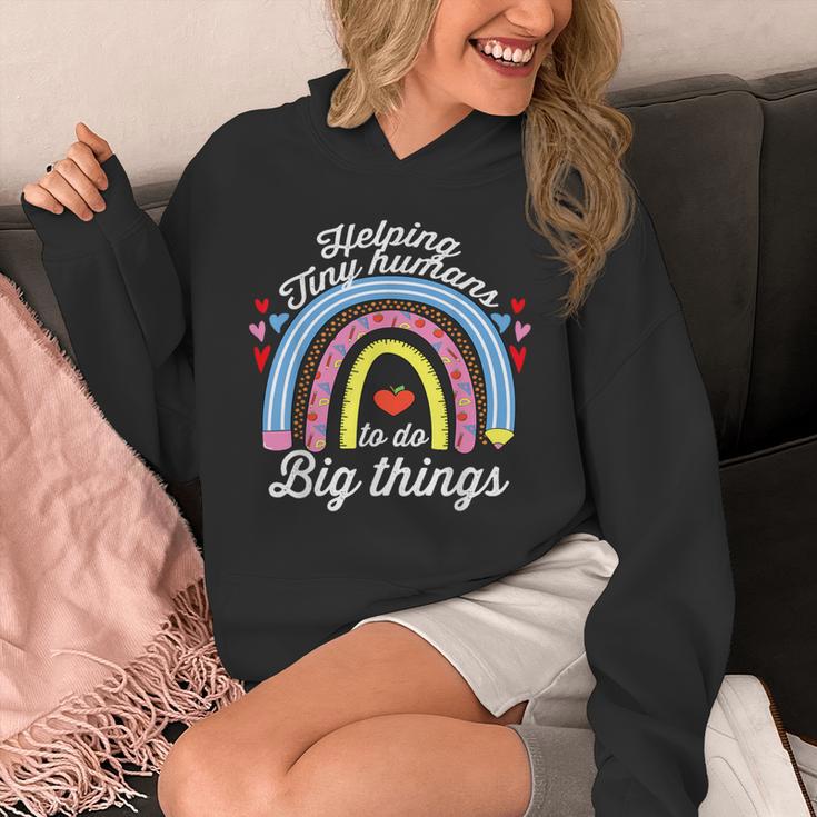 Helping Tiny Humans To Do Big Things Teacher Women Unisex Hoodie, funny design Helping Tiny Humans To Do Big Things Teacher Women Unisex Hoodie, funny design