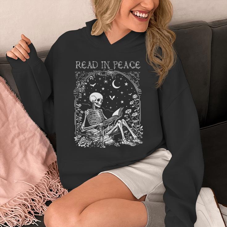 Read In Peace Skeleton Reading Teacher Spooky Halloween Unisex Hoodie, funny design Read In Peace Skeleton Reading Teacher Spooky Halloween Unisex Hoodie, funny design