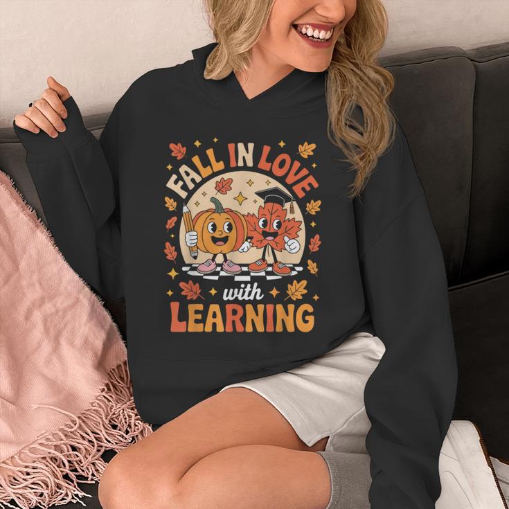 Retro Fall In Love With Learning Pumpkin Leaf Teacher Autumn Unisex Hoodie, funny design