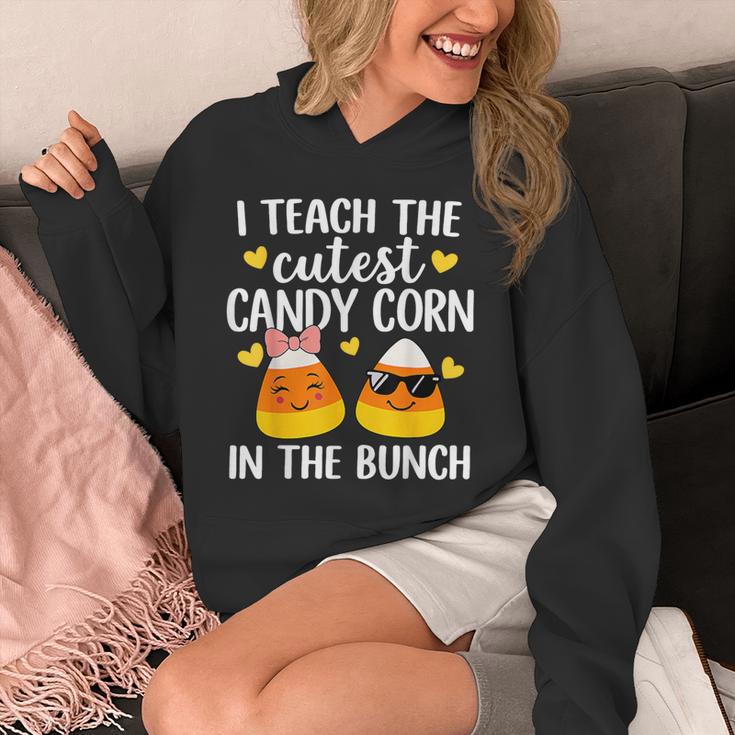 I Teach The Cutest Candy Corn In The Bunch Teacher Halloween Unisex Hoodie, funny design