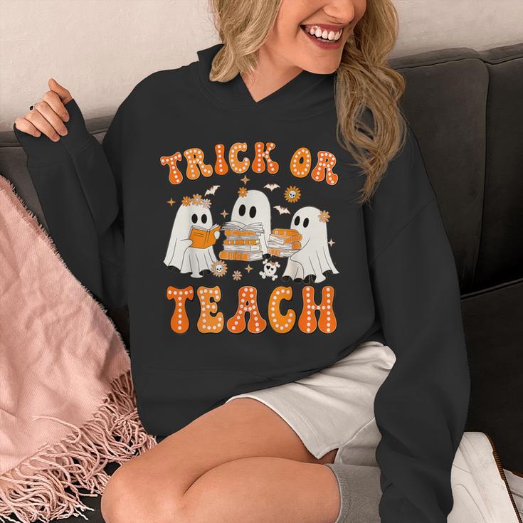 Teacher Halloween Trick Or Teach Retro Groovy Floral Ghost Unisex Hoodie, Groovy Teacher Gifts, funny design Teacher Halloween Trick Or Teach Retro Groovy Floral Ghost Unisex Hoodie, Groovy Teacher Gifts, funny design