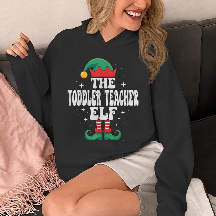The Toddler Teacher Elf Christmas Matching Family Unisex Hoodie, funny design The Toddler Teacher Elf Christmas Matching Family Unisex Hoodie, funny design