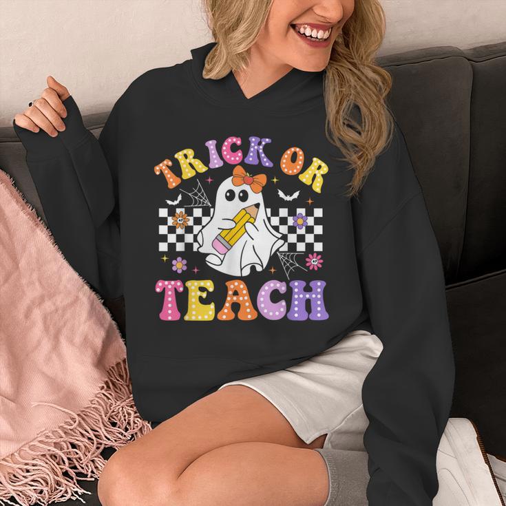 Trick Or Teach Groovy Halloween Teachers Unisex Hoodie, funny design Trick Or Teach Groovy Halloween Teachers Unisex Hoodie, funny design