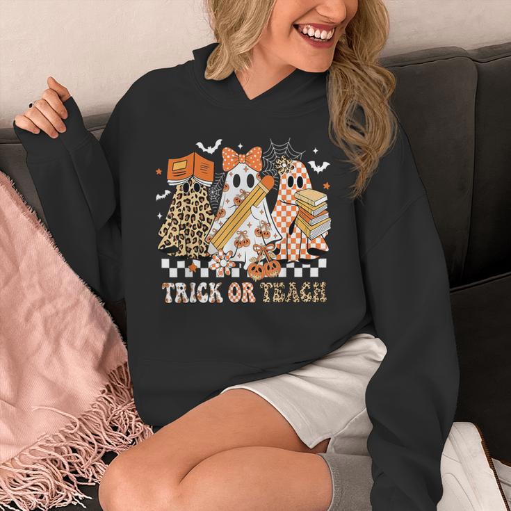 Trick Or Teach Groovy Teacher Halloween Floral Ghost Unisex Hoodie, Groovy Teacher Gifts, funny design