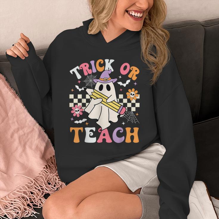 Trick Or Teach Groovy Teacher Halloween Retro Teacher Ghost Unisex Hoodie, Groovy Teacher Gifts, funny design Trick Or Teach Groovy Teacher Halloween Retro Teacher Ghost Unisex Hoodie, Groovy Teacher Gifts, funny design