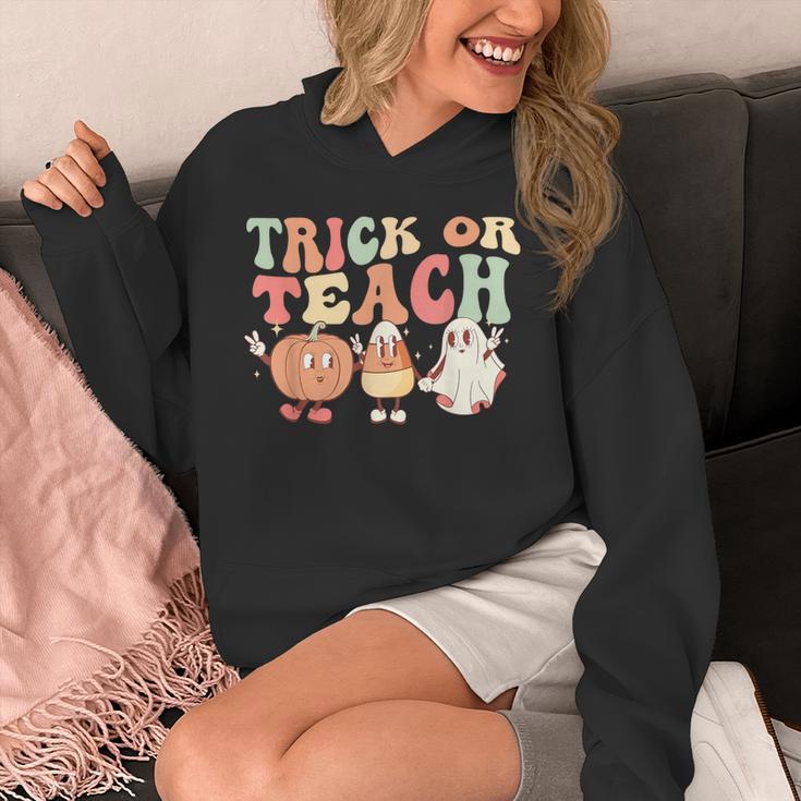 Trick Or Teach Pumpkin Candy Corn Ghost Halloween Teacher Unisex Hoodie, funny design Trick Or Teach Pumpkin Candy Corn Ghost Halloween Teacher Unisex Hoodie, funny design