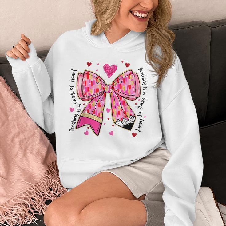 Teaching Is A Work Of Heart Pencil Bow Teacher Valentine Unisex Hoodie, funny design Teaching Is A Work Of Heart Pencil Bow Teacher Valentine Unisex Hoodie, funny design