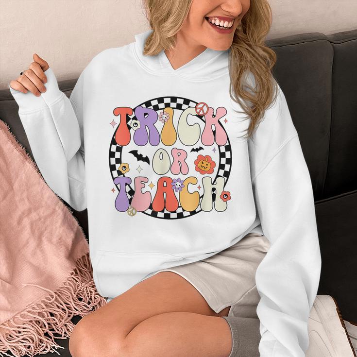 Trick Or Teach Retro Groovy Halloween Teacher Unisex Hoodie, Groovy Teacher Gifts, funny design