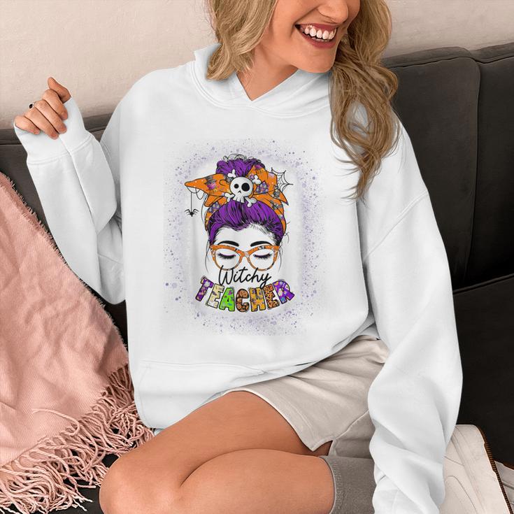 Witchy Teacher Halloween Messy Bun Teacher Bleached Unisex Hoodie, funny design