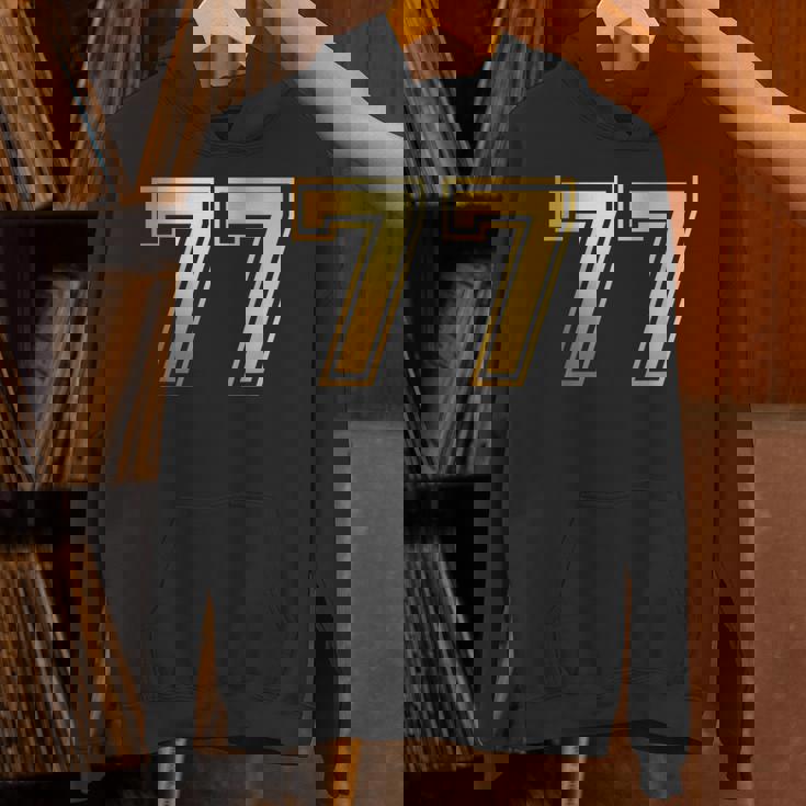 77 ナンバーセブンティセブンチーム スポーツ グラフィック 代表チームマッチング パーカー