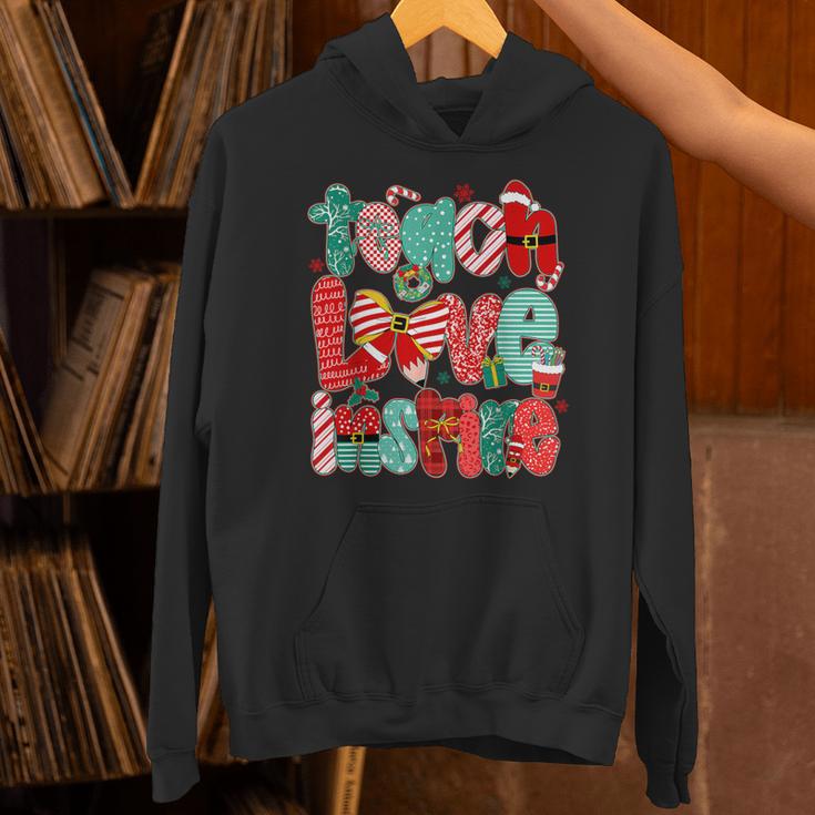 Christmas Coquette Bow Teacher Teach Love Inspire Unisex Hoodie, gift for family, gift for coworker Christmas Coquette Bow Teacher Teach Love Inspire Unisex Hoodie, gift for family, gift for coworker