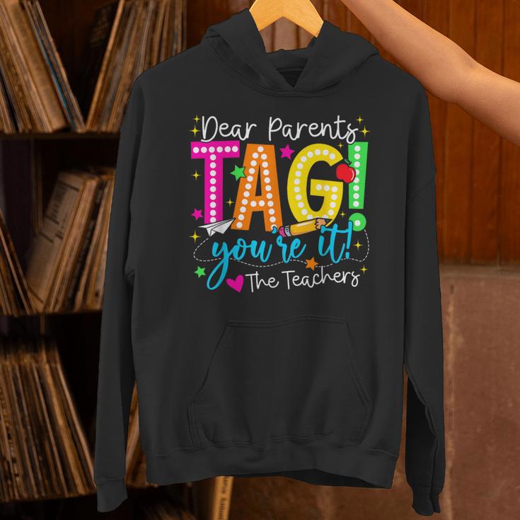Dear Parents Tag You'Re It Love Teachers Last Day Of School Unisex Hoodie, gift for family, gift for coworker