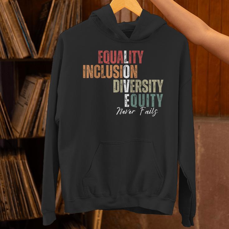 Equality Inclusion Diversity Equity Love Never Fails Teacher Unisex Hoodie, gift for family, gift for coworker Equality Inclusion Diversity Equity Love Never Fails Teacher Unisex Hoodie, gift for family, gift for coworker